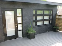 window with shaped transom with sidelites grills